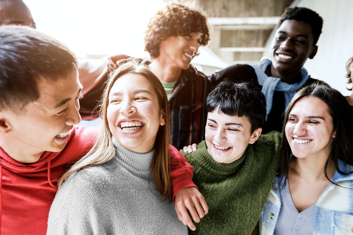 A group of friends smiling and laughing